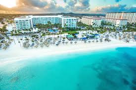 Aruba Marriott Resort and Stellaris Casino beachfront property with large pool complex in Palm Beach.