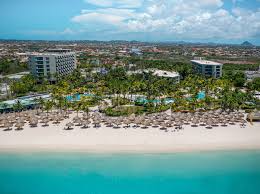 Hilton Aruba Caribbean Resort with beachfront pools and casino in Palm Beach.