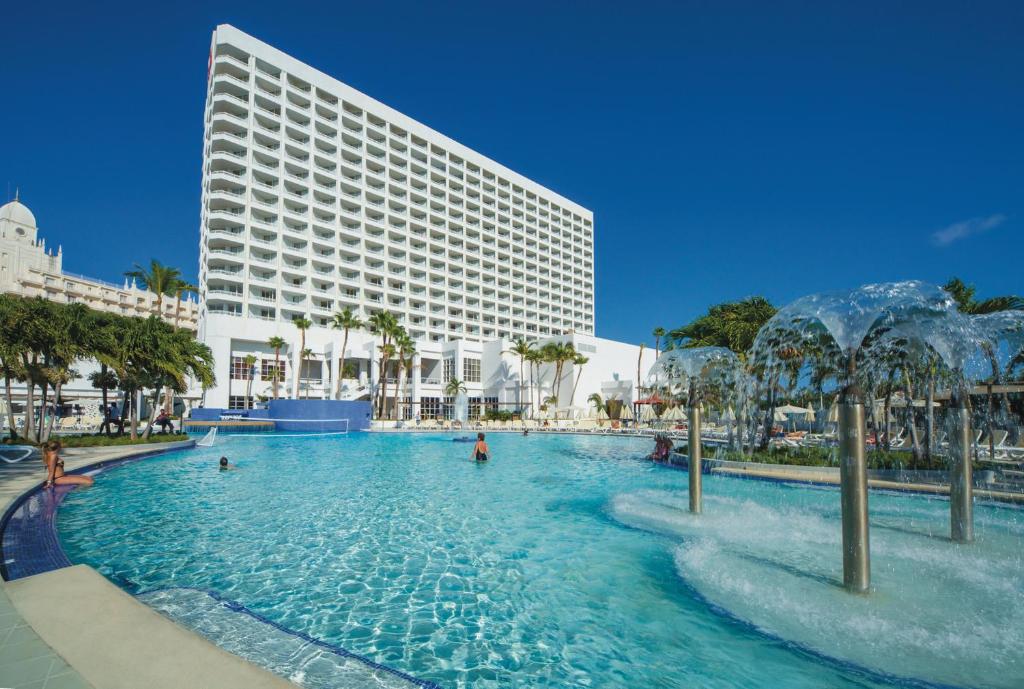 Riu Palace Antillas adults-only all-inclusive resort with beachfront pool area in Aruba.